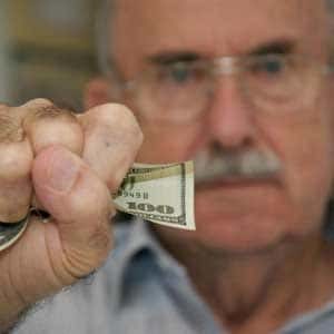 Man with a fist full of money